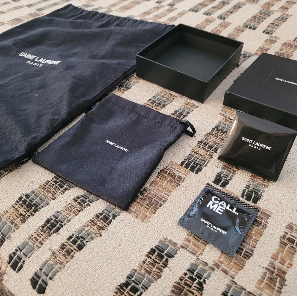 Saint Laurent dust bag, box and accessory.